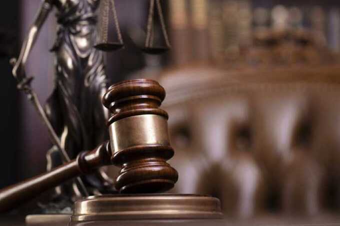 Суд приговорил лидера «Фалунь Дафа» к четырём годам колонии